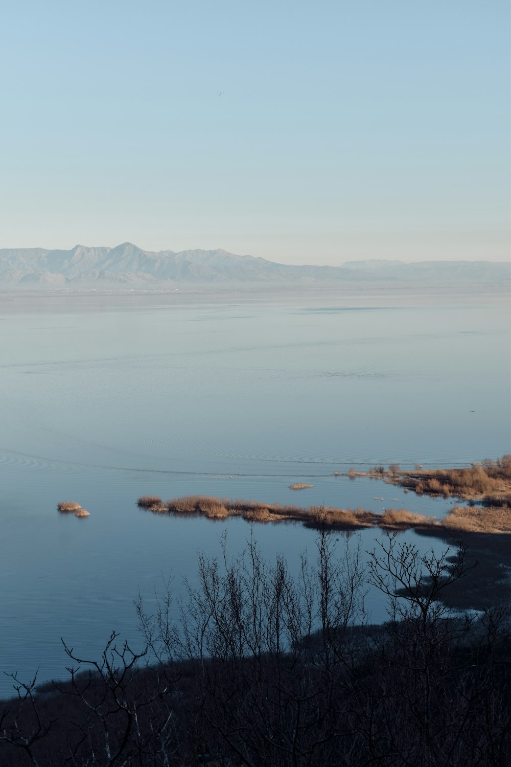 a large body of water surrounded by mountains