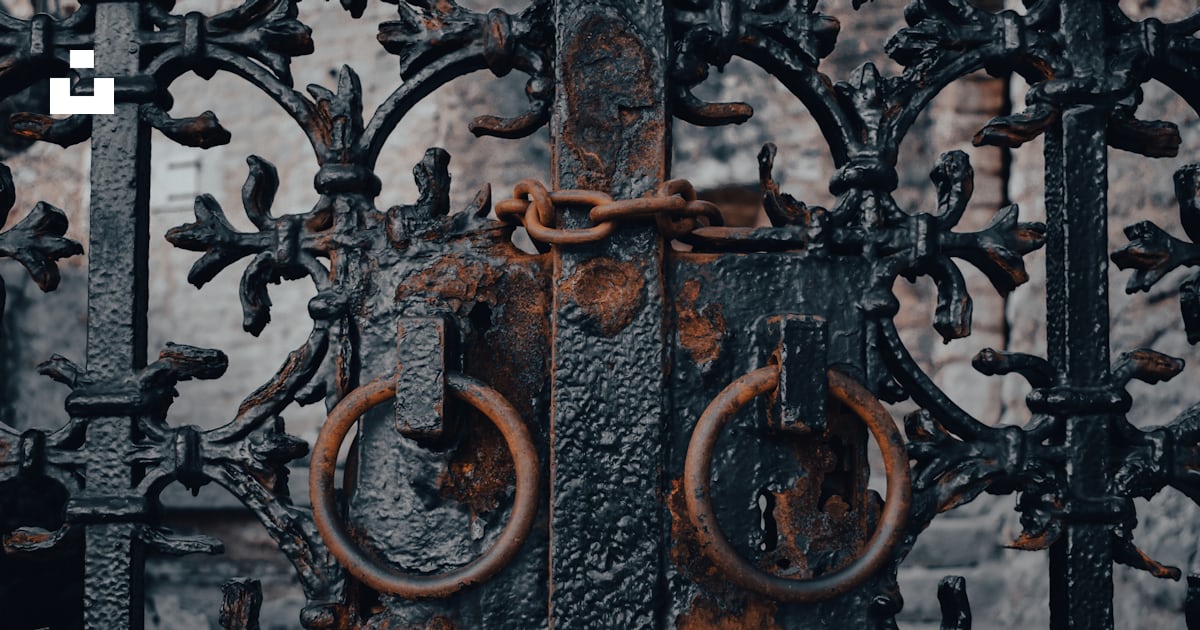 A close up of a metal gate with rust photo – Free Sveti stefan Image on ...