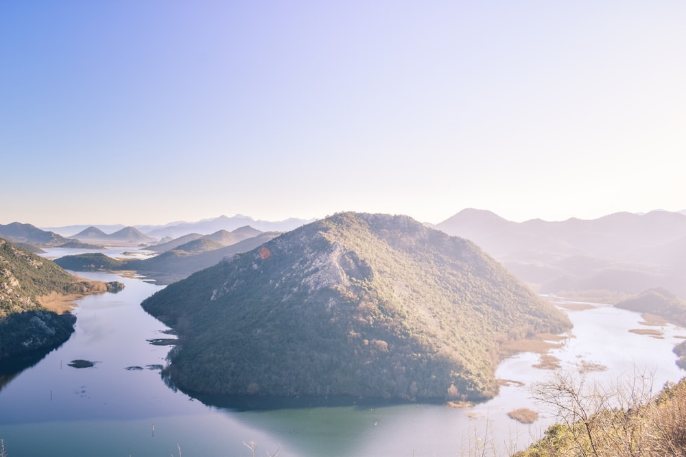 a large body of water surrounded by mountains