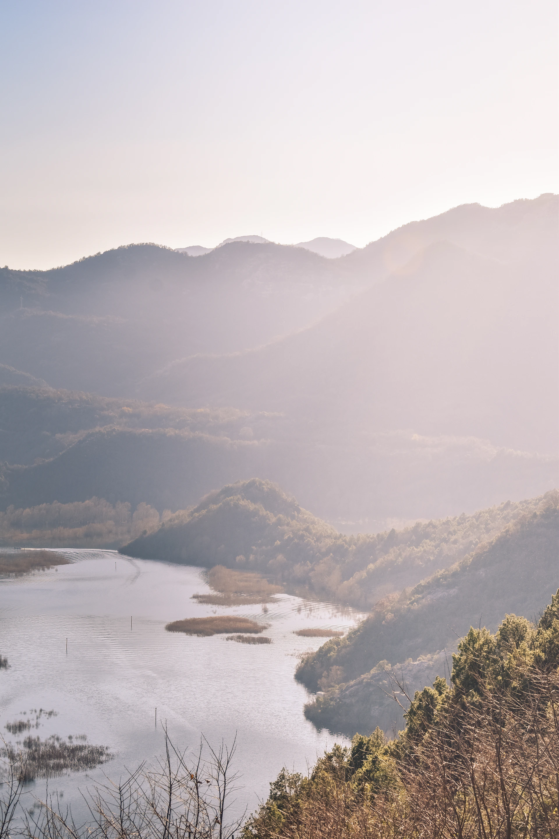 a large body of water surrounded by mountains