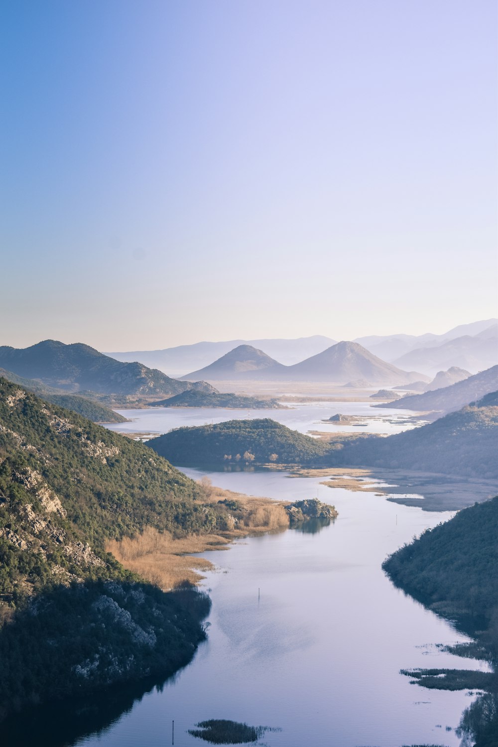 a large body of water surrounded by mountains