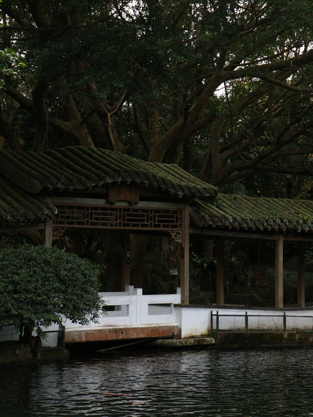 a building sitting on top of a body of water