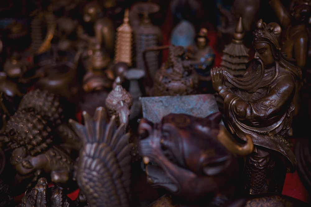 a bunch of different types of figurines on a table