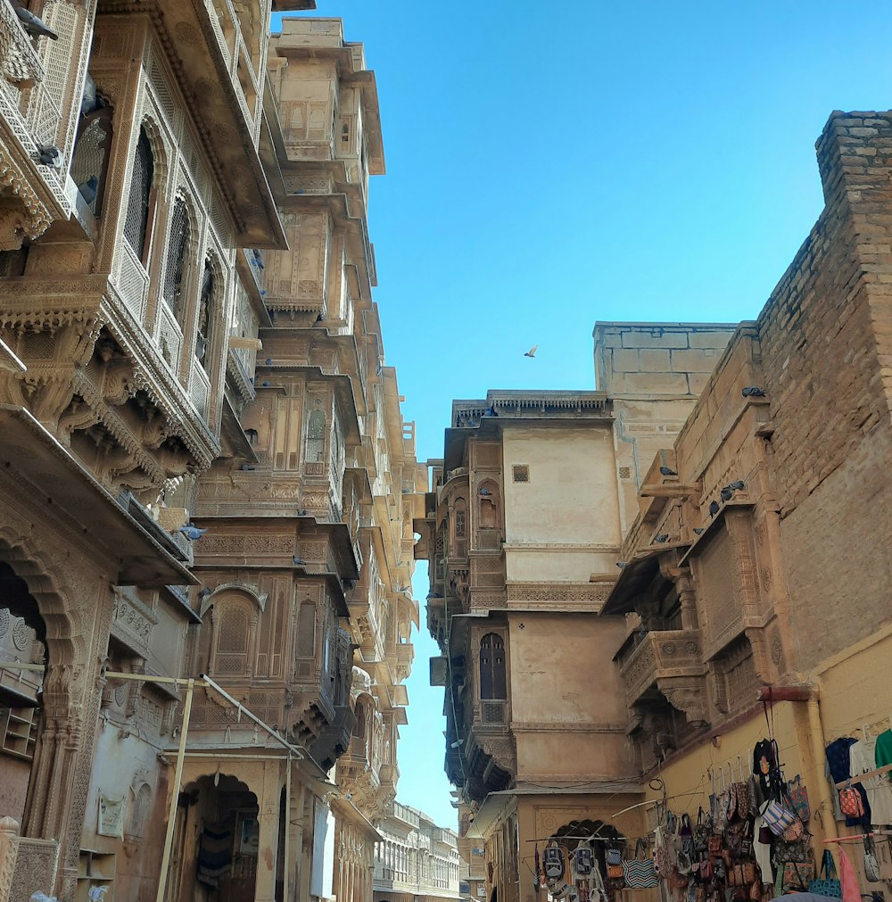 a narrow street with a few buildings on both sides