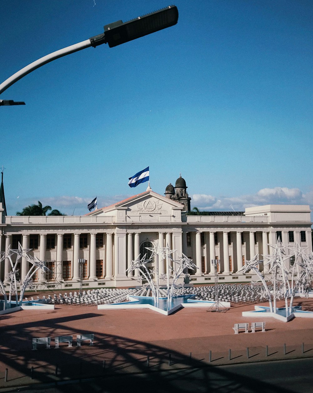 a large building with a flag on top of it