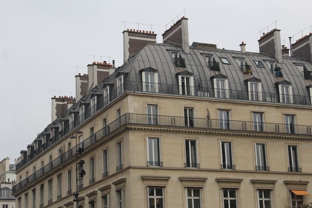 a building with a lot of windows and balconies