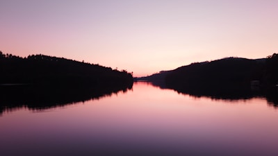 A serene view of the Miramichi River at sunset, inviting relaxation and exploration.