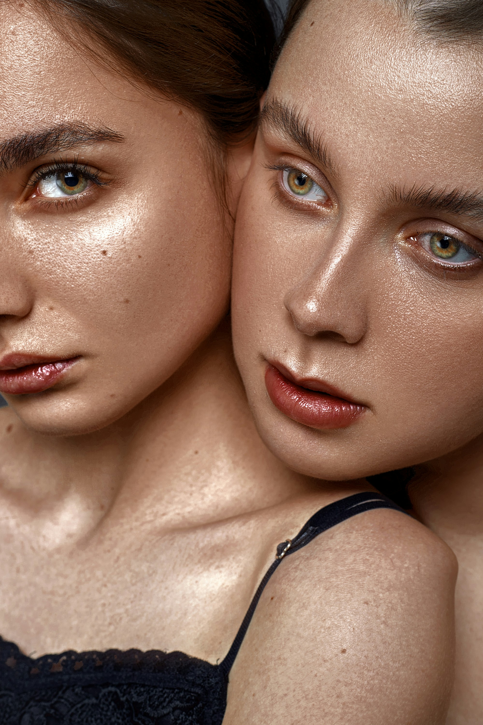 two beautiful young women posing for a picture