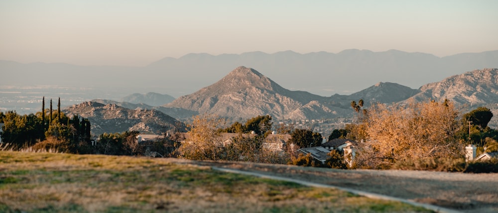 a view of a mountain range from a hill