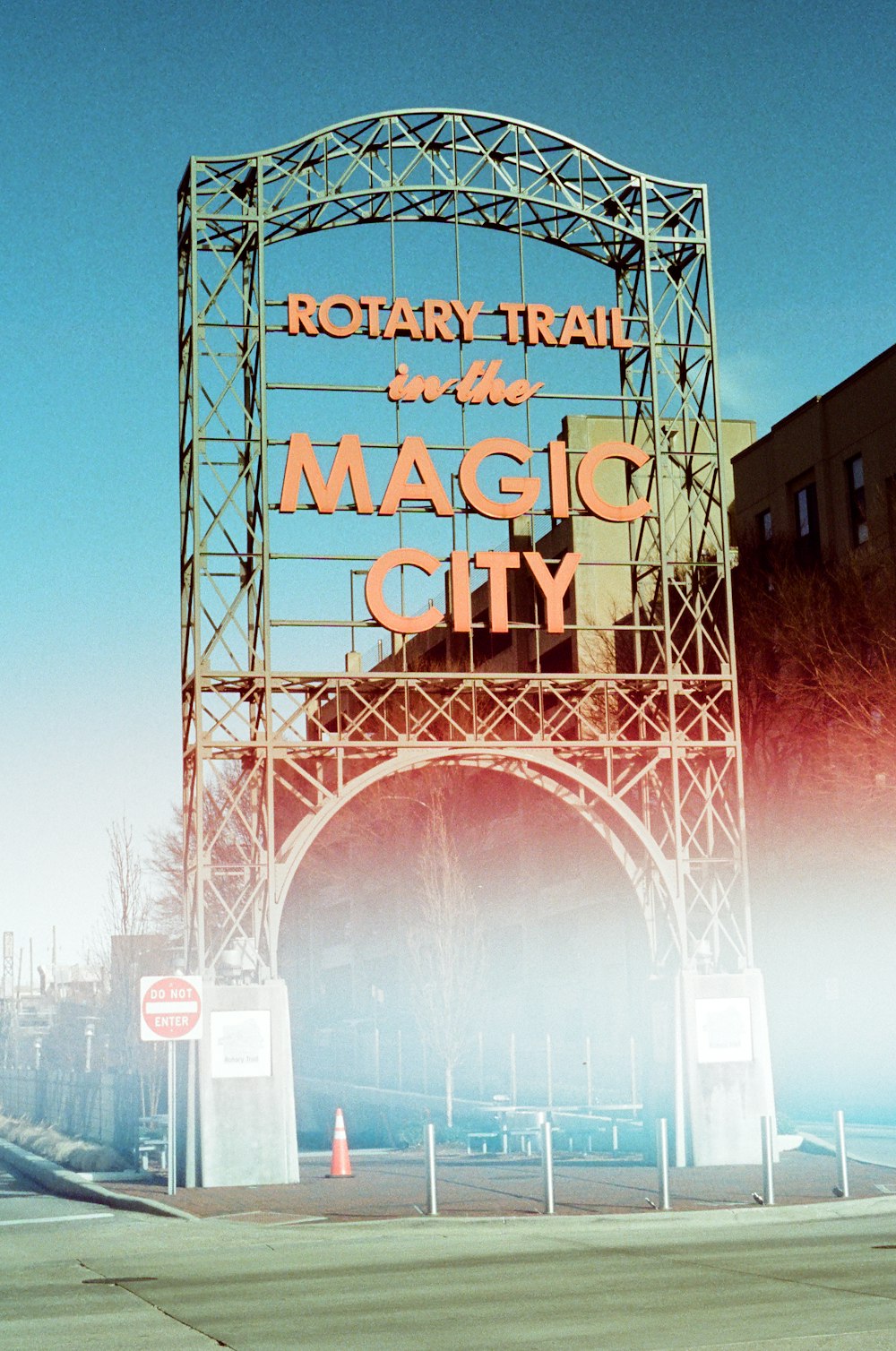 a large sign on the side of a building that says rotary trail to the magic