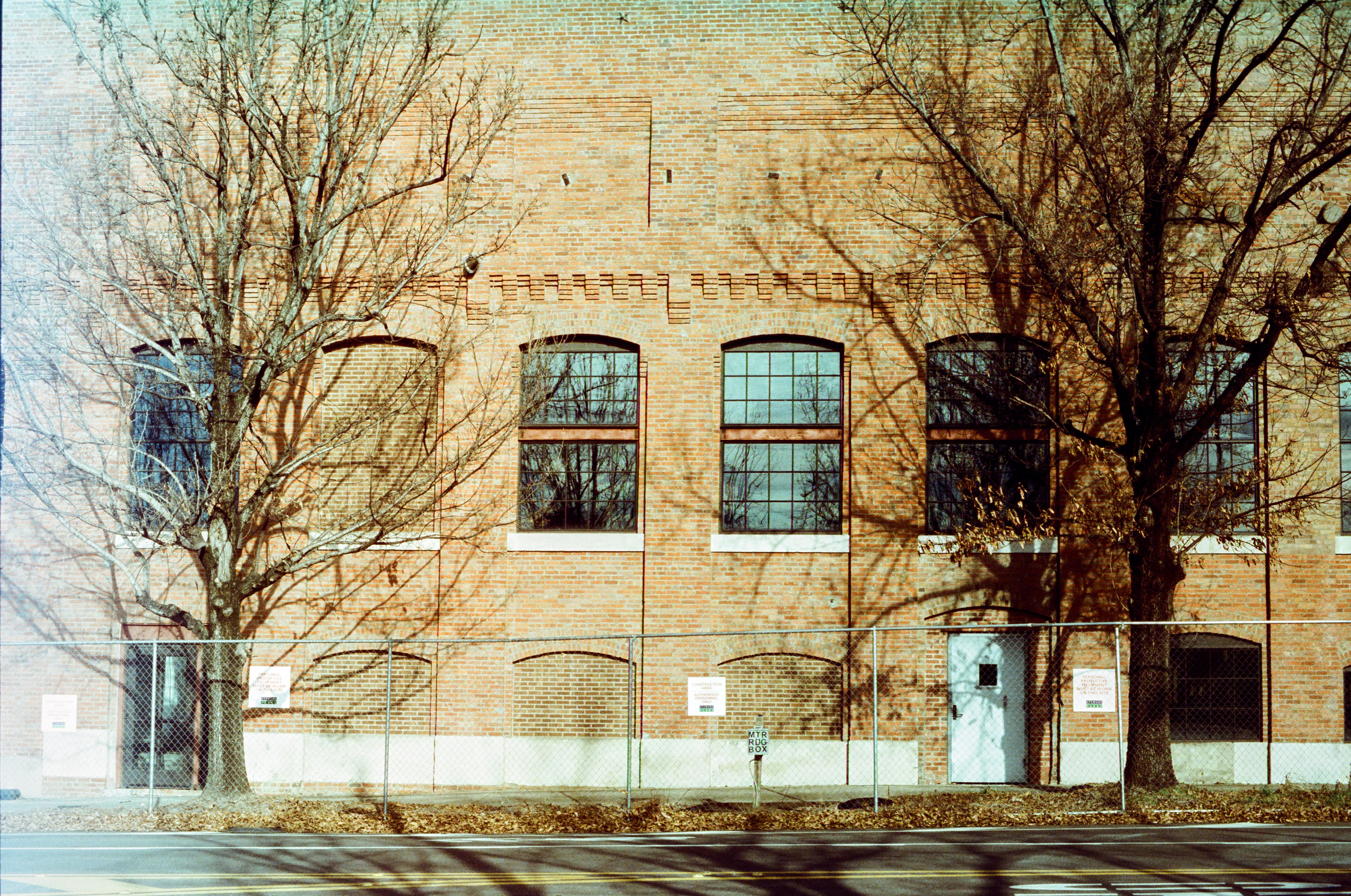 exterior of a historic Detroit building with classic industrial features - lofts for rent detroit mi