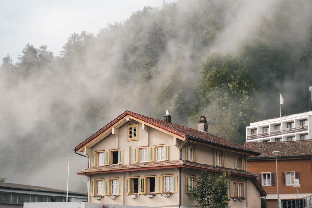 a house with a mountain in the background