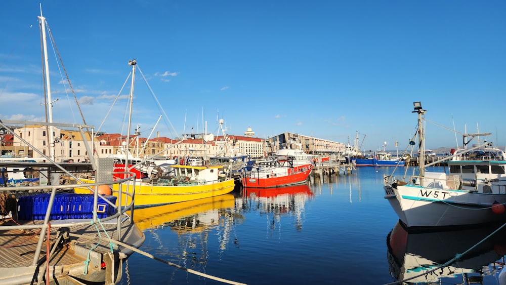 a group of boats that are sitting in the water