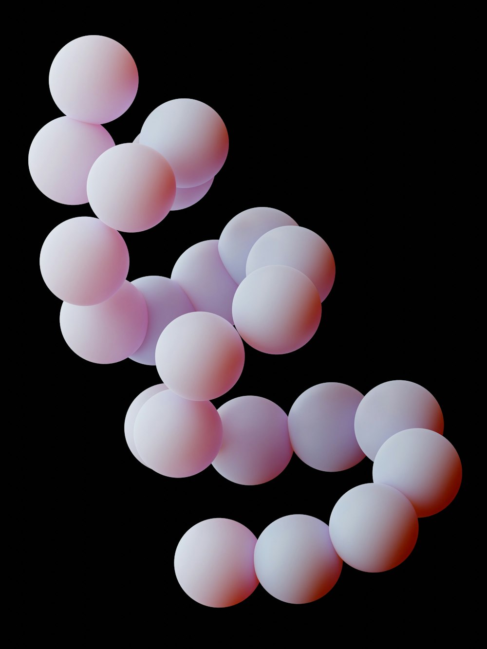 a group of pink balls floating in the air