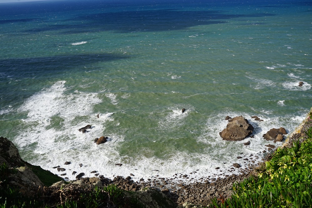 a view of the ocean from a cliff