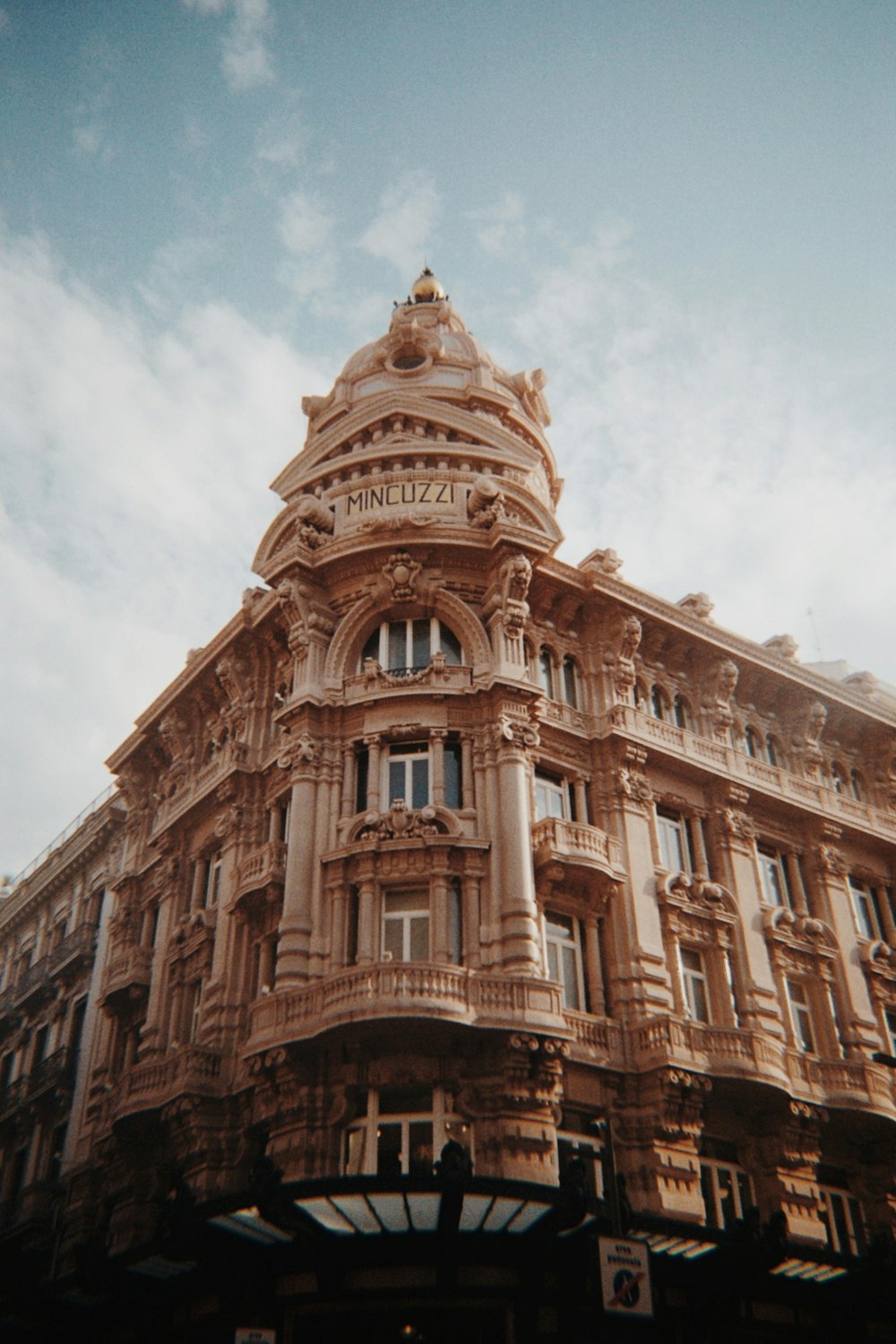 a tall building with a clock on the top of it