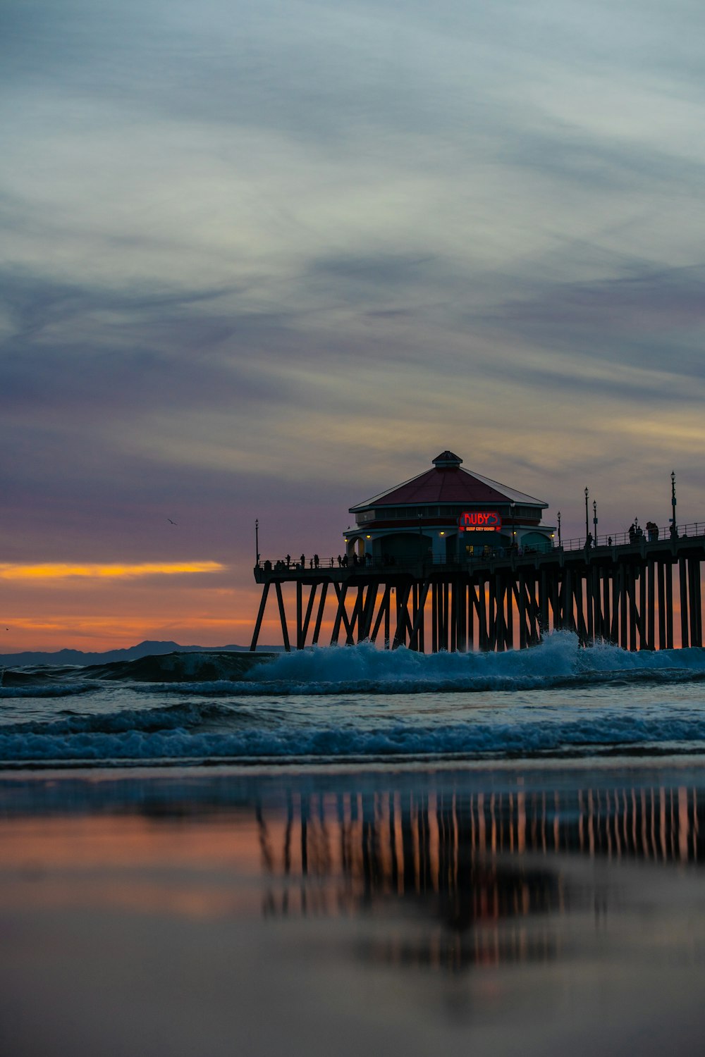 a pier that is next to a body of water