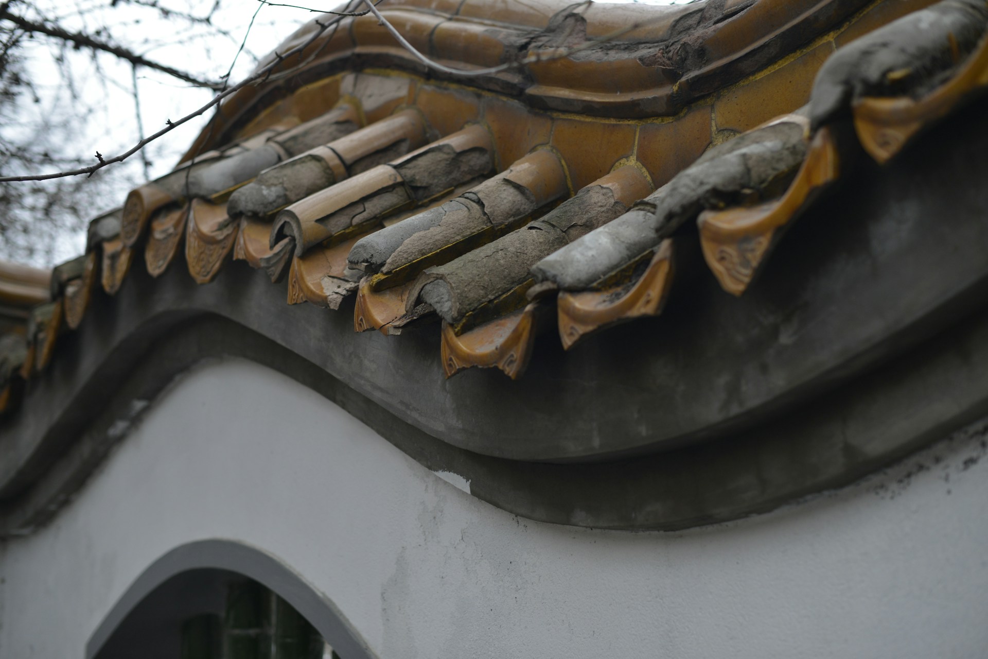 woman wearing yellow long-sleeved dress under white clouds and blue sky during daytime