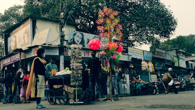 A vibrant street scene in Bhiwani showing various small businesses and service providers.