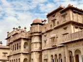 a large building with many windows and balconies