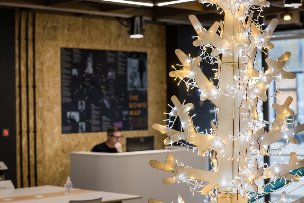a white christmas tree in an office setting