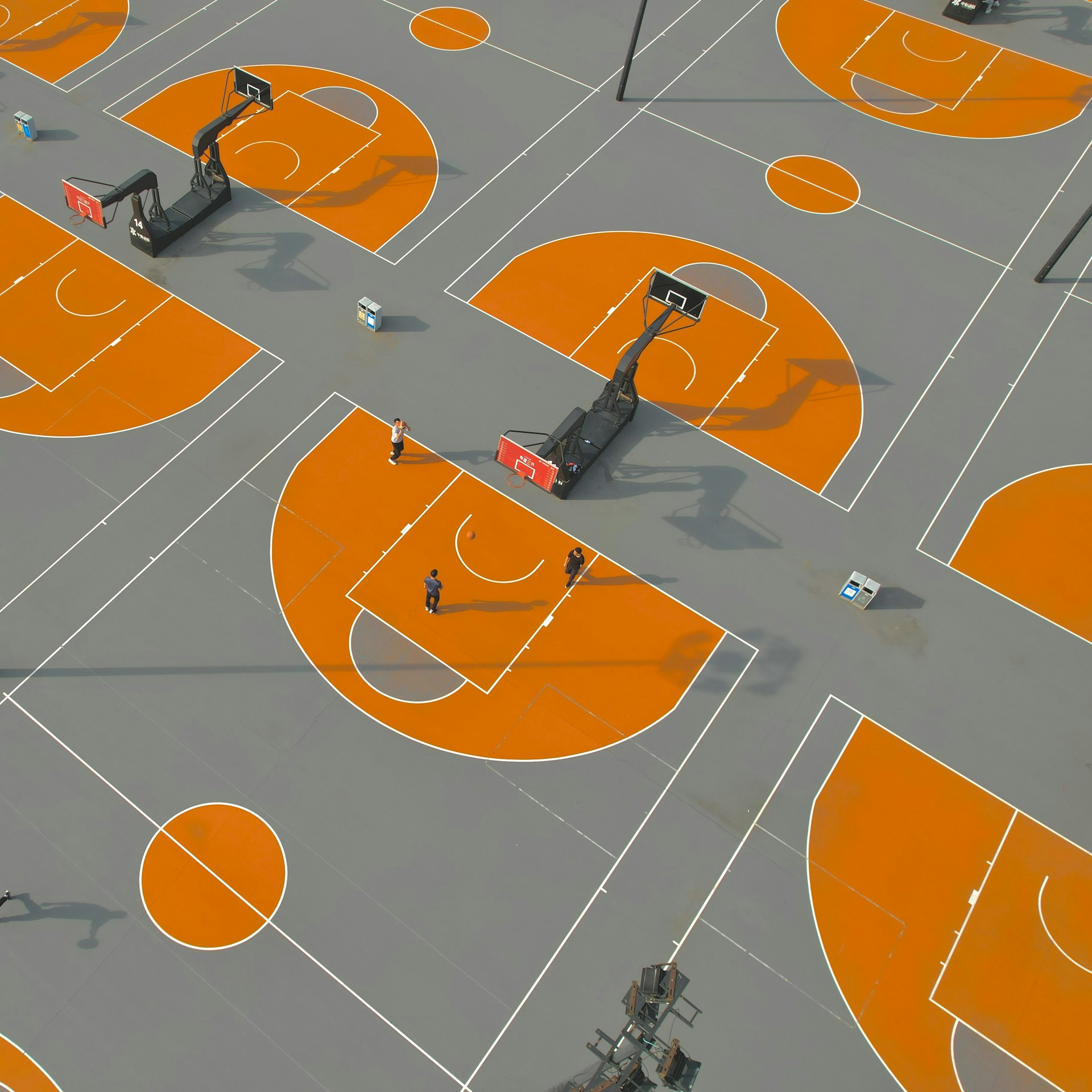 an overhead view of a basketball court with orange markings