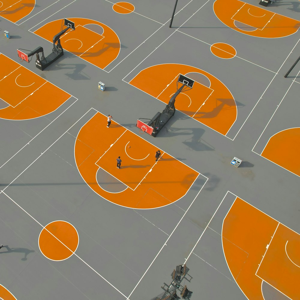 an overhead view of a basketball court with orange markings