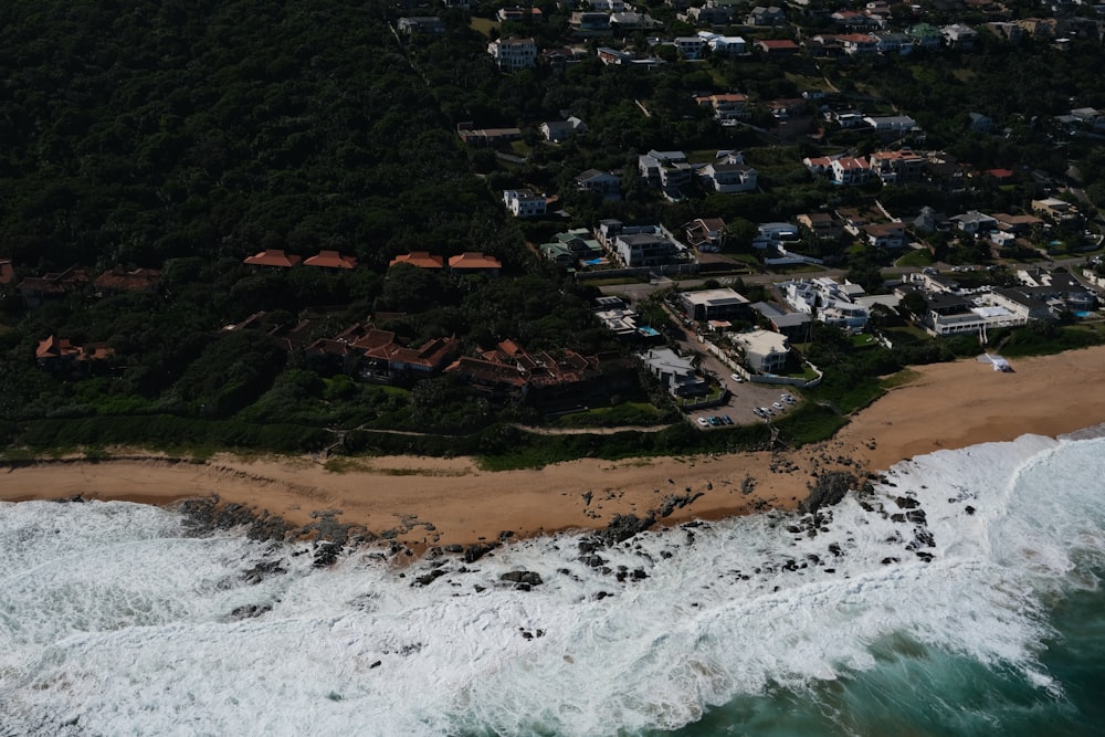 a bird's eye view of a beach and ocean