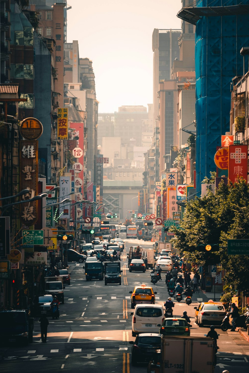 a city street filled with lots of traffic