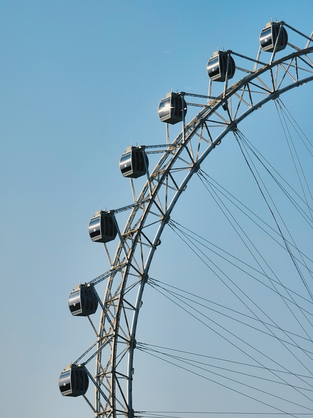 a large ferris wheel with lots of lights on top of it