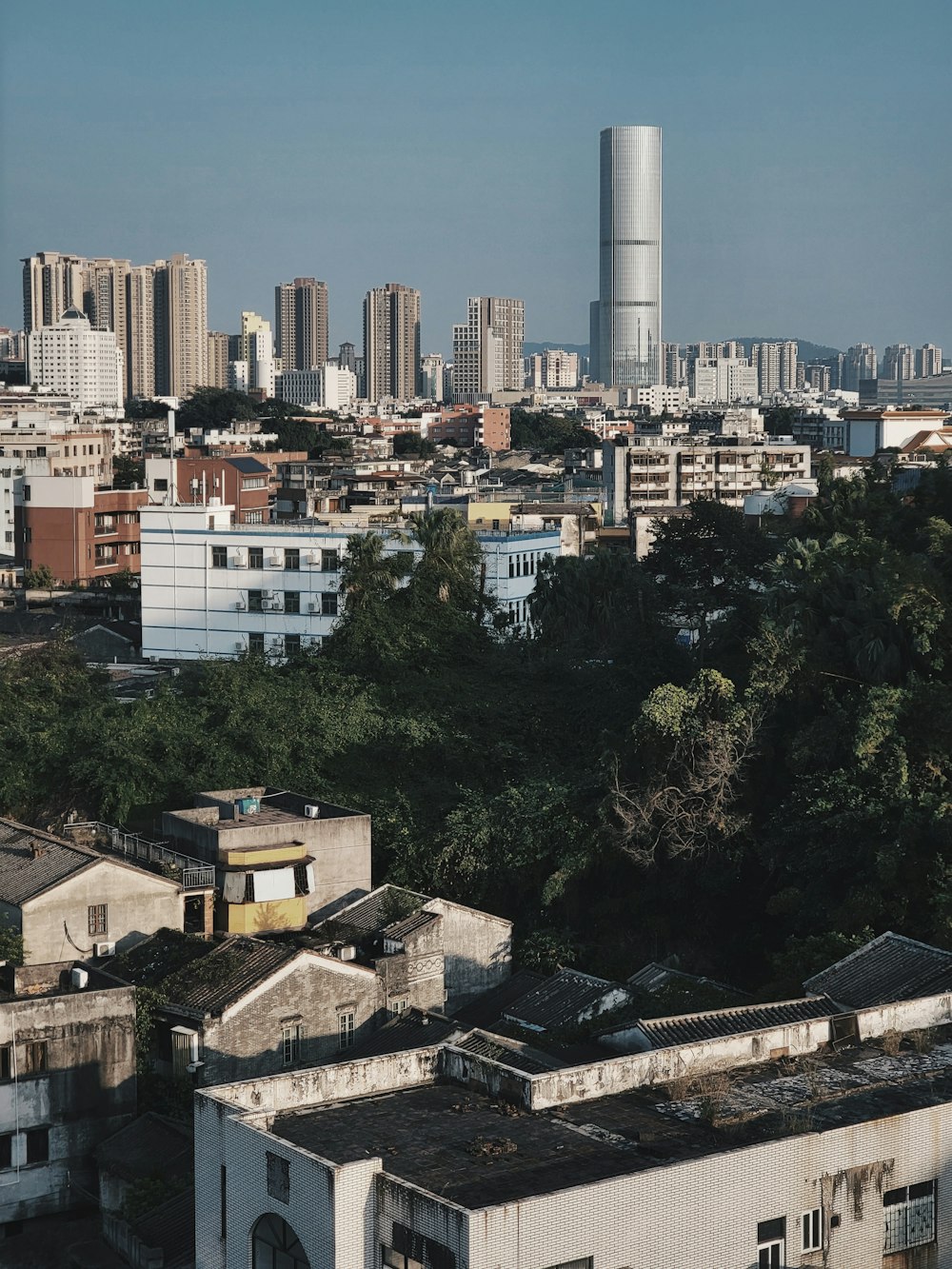 a view of a city with tall buildings