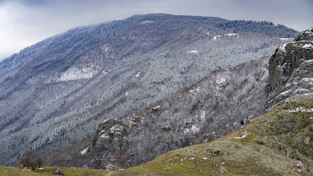 a view of a mountain with snow on it