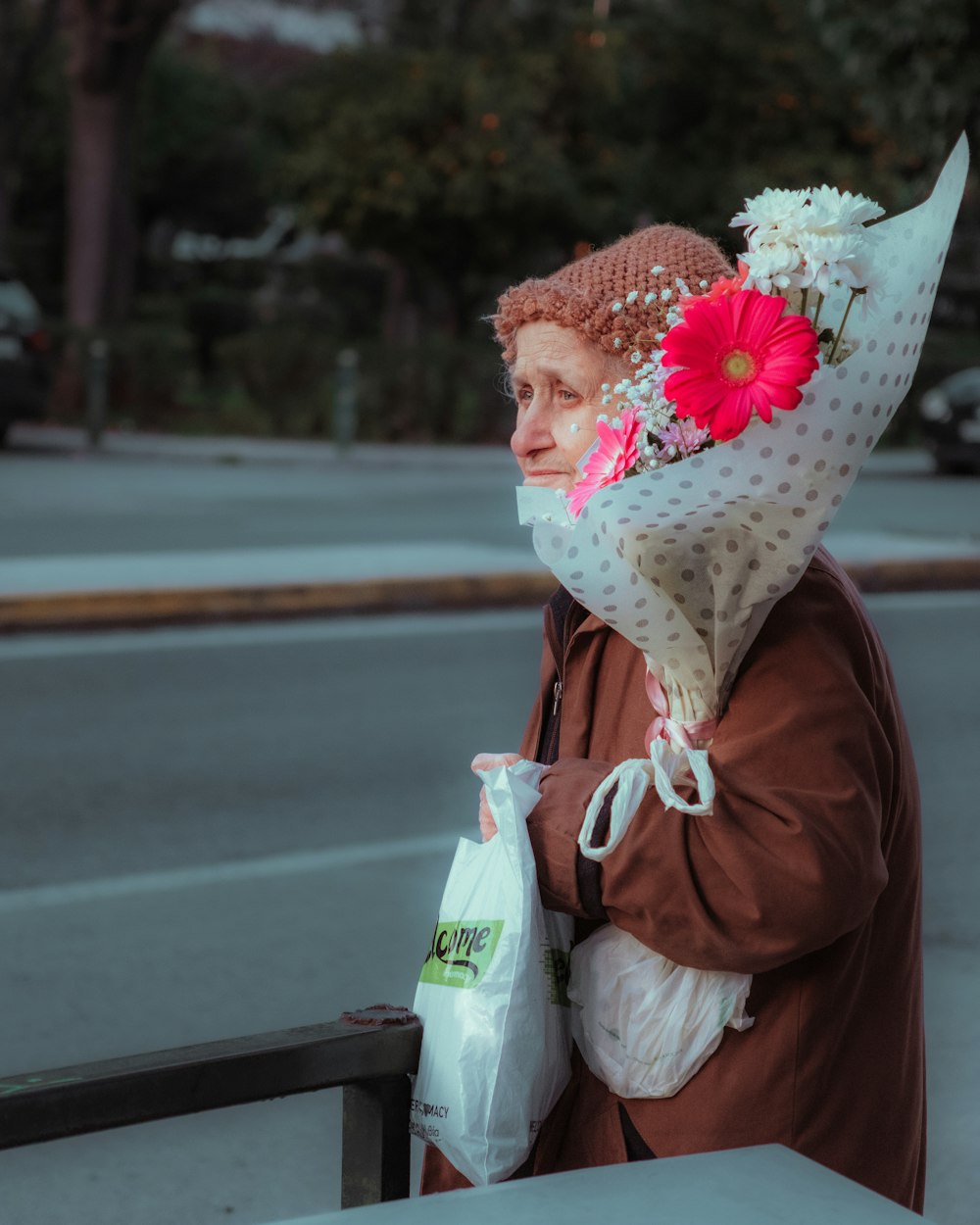 a woman with a bouquet of flowers on her head
