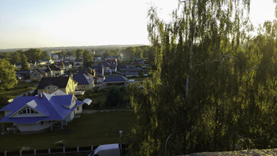 A cozy residential neighborhood with tree-lined streets and inviting homes.