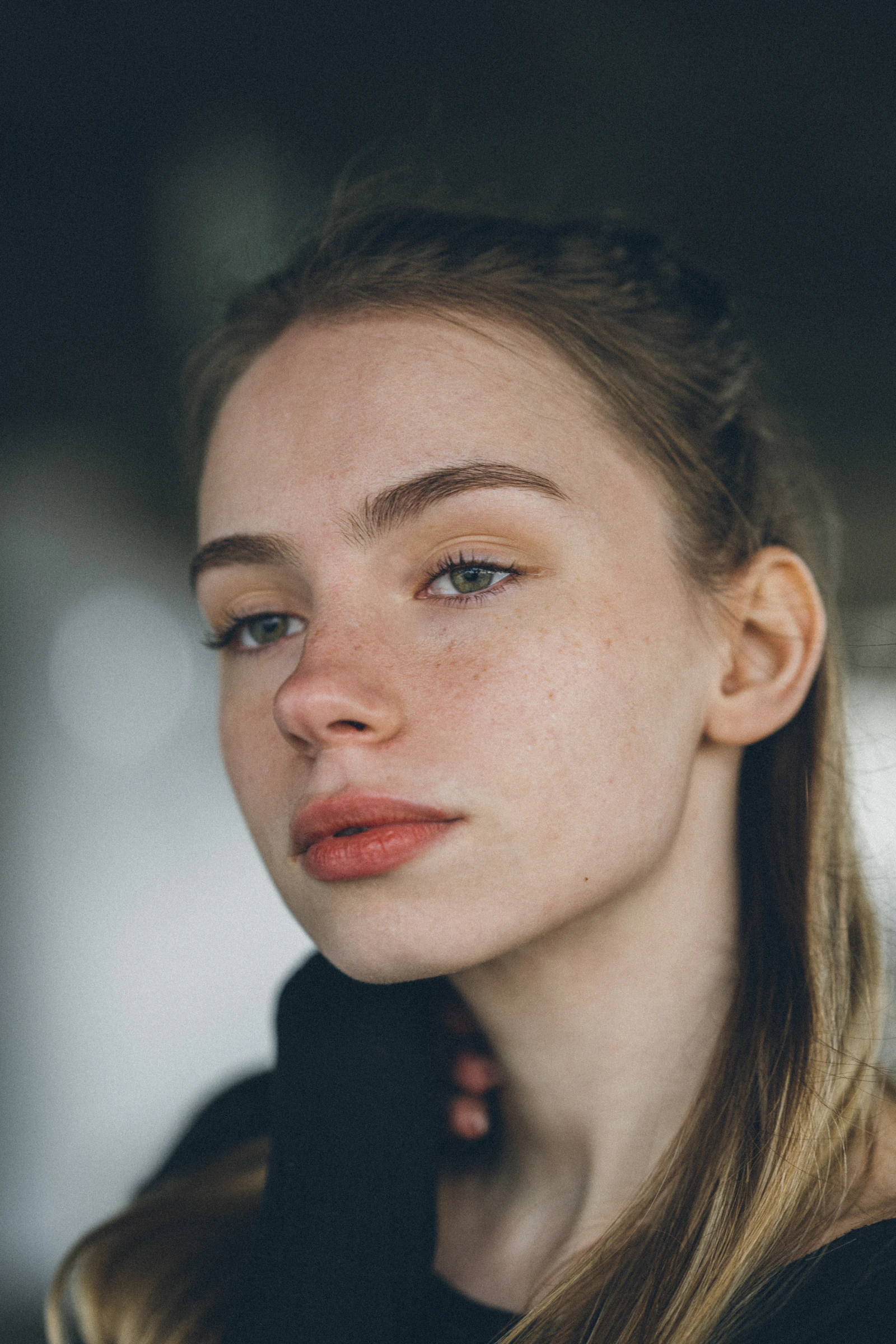 Close portrait illustrating even skin tone after a pigmentation course