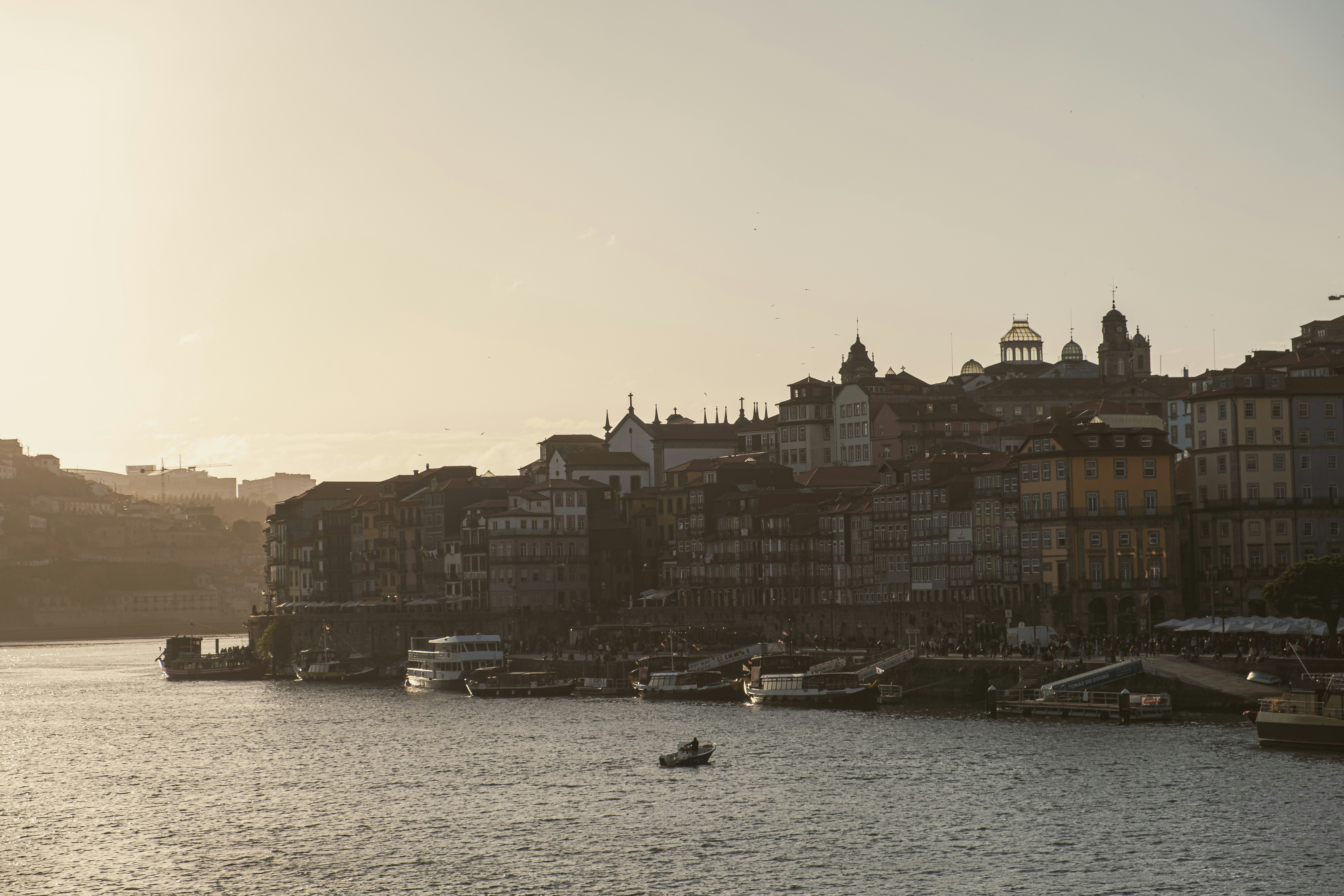 a body of water that has a bunch of boats in it