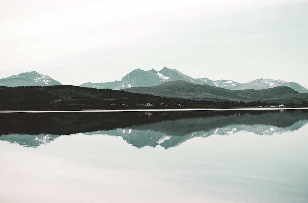 a large body of water surrounded by mountains