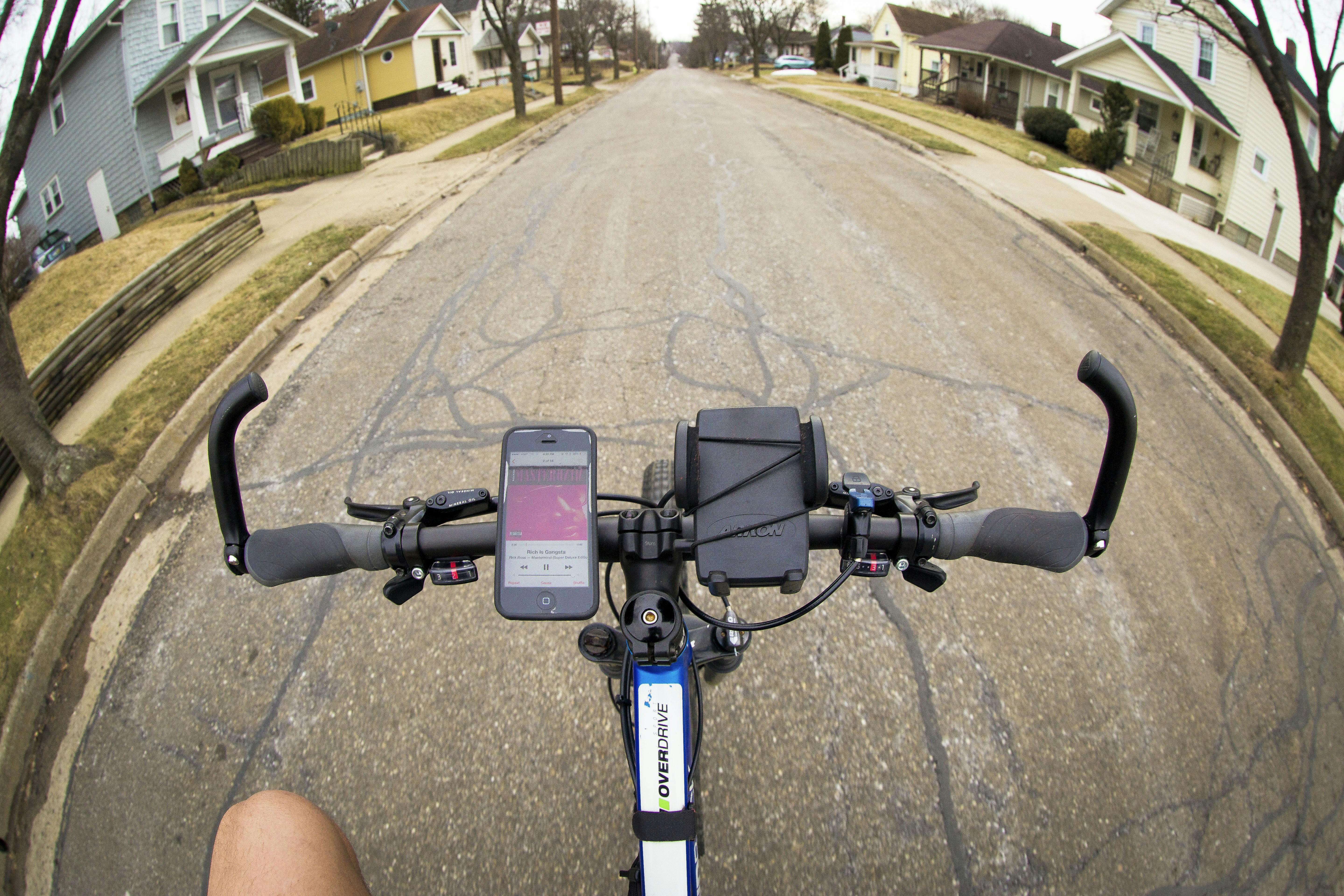 A cyclist checking their phone