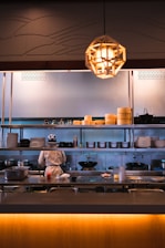 a chef is preparing food in a kitchen