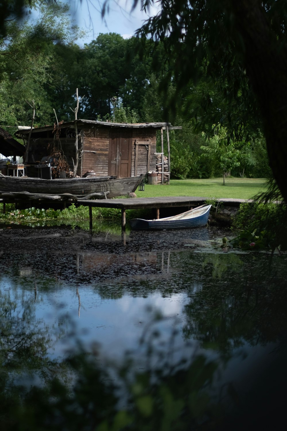 a boat sitting on top of a body of water