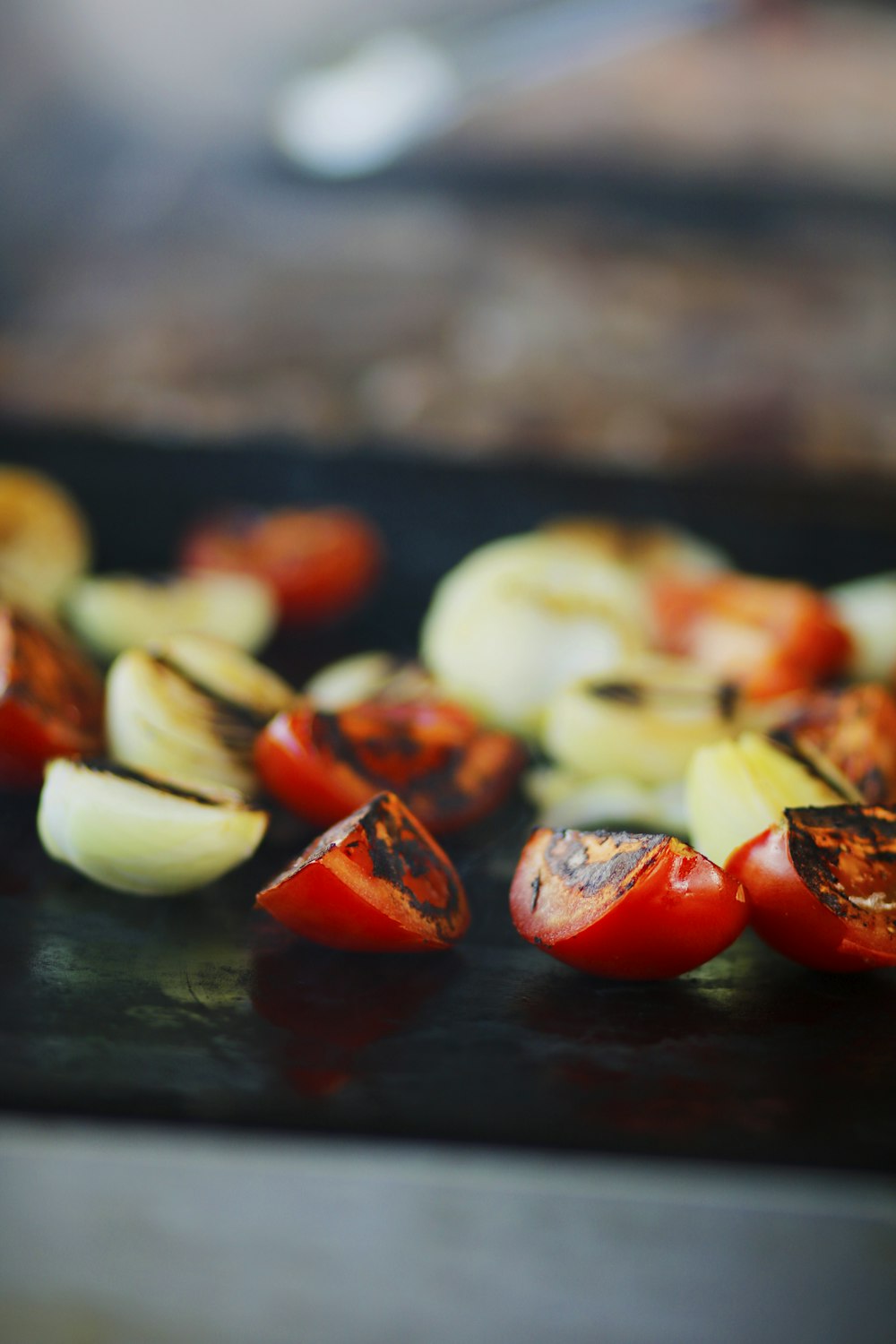 a close up of sliced vegetables on a grill