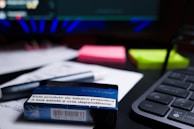 Close-up of detailed medical documents and notes spread out on a desk.