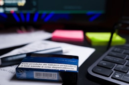 Close-up of safety documents and risk assessment forms on a desk.