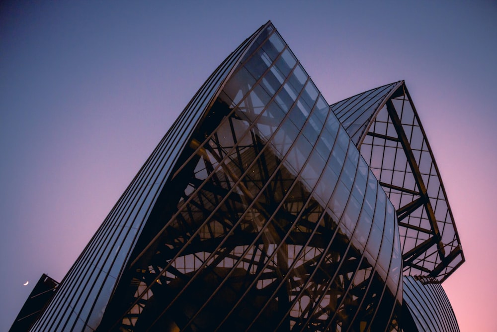 a very tall building with a sky background