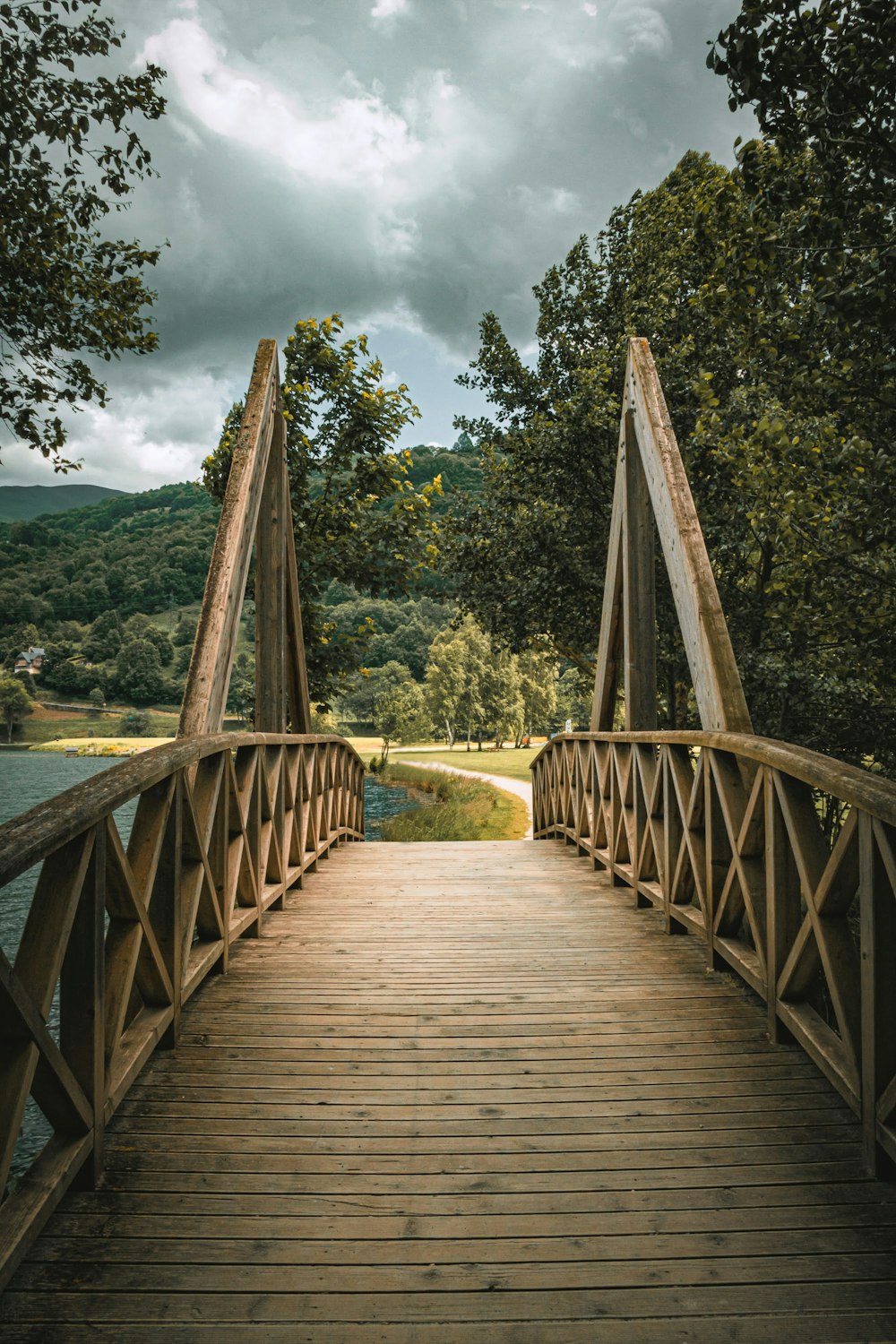 a wooden bridge over a body of water