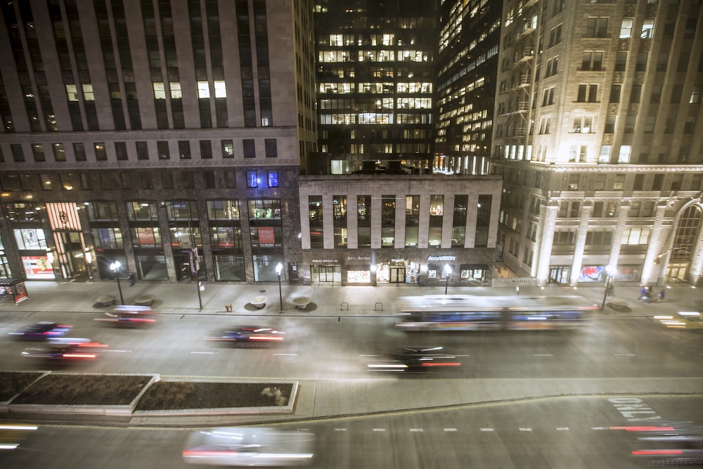 a city street filled with lots of traffic at night