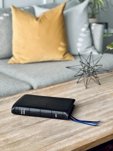 a book sitting on top of a wooden table