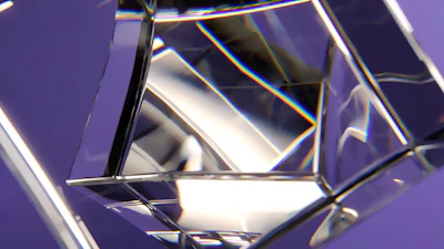 Close-up of a laser-cut acrylic decorative piece in soft purple hues on a white background
