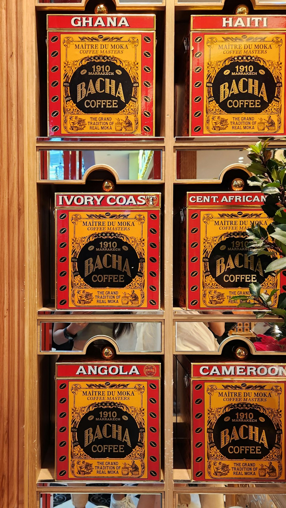 a display case filled with lots of different types of coffee
