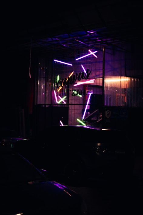 Futuristic neon-lit storefront with purple and blue hues